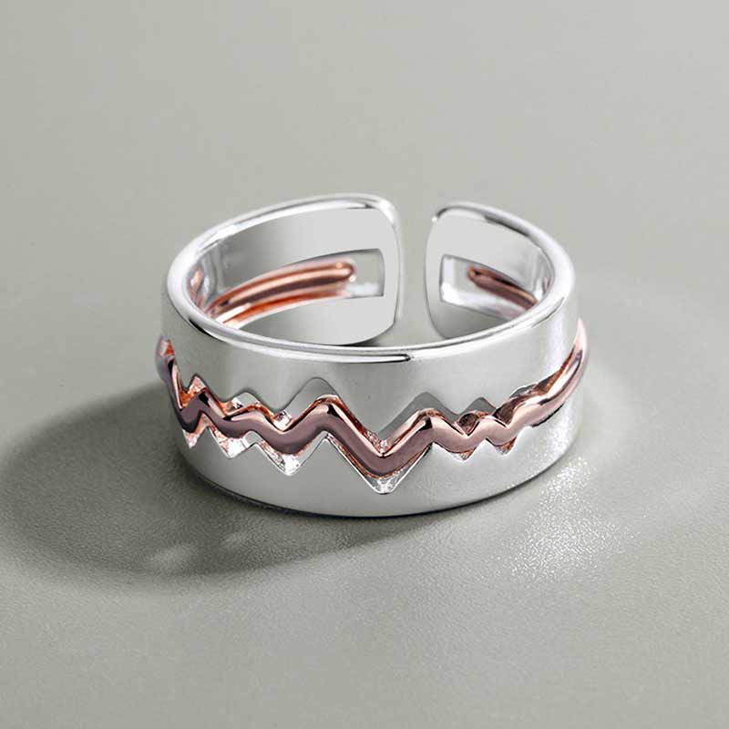 Passende Herzschlag-Paarringe