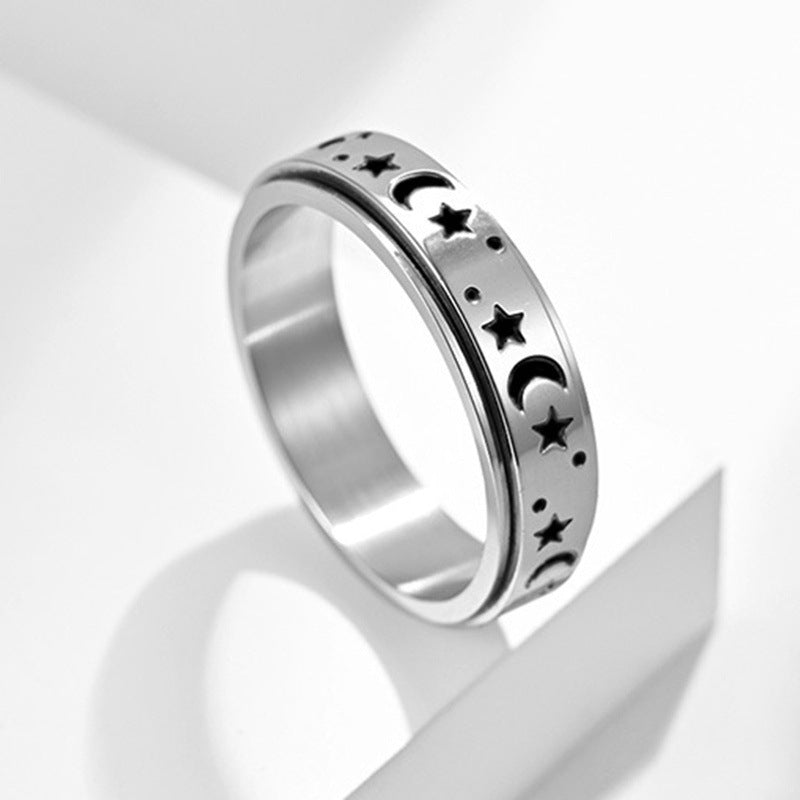 Rotierender Retro Stern- und Mondring